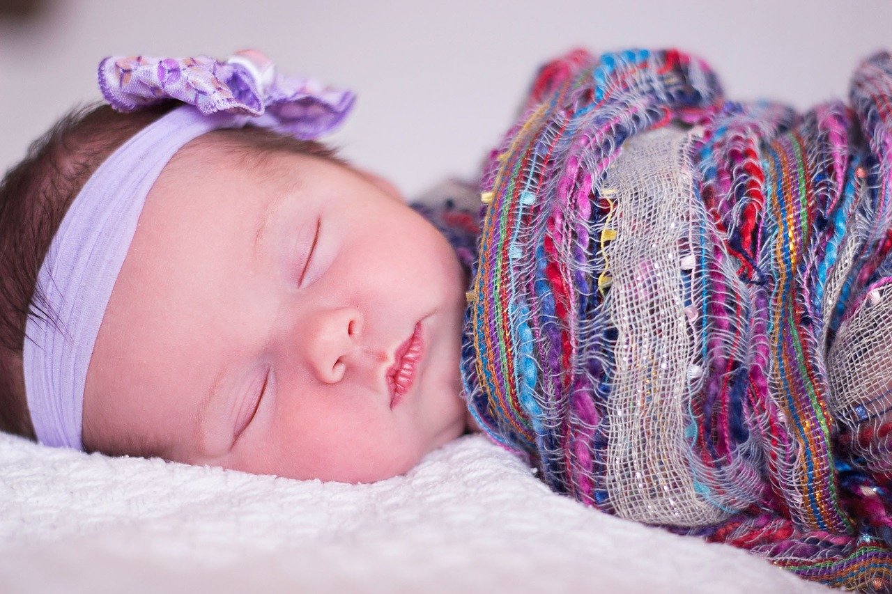 When Can My Baby Sleep With a Blanket? MOM News Daily