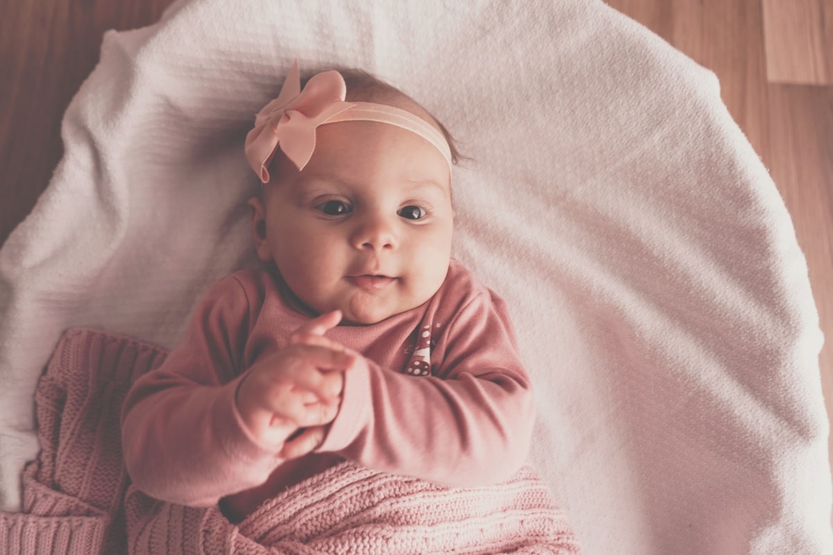 little cute baby girl lying in basket 2022 03 30 20 23 48 utc